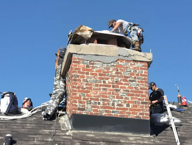 San Jacinto Chimney Sweep installing a custom chimney crown in San Jacinto, CA