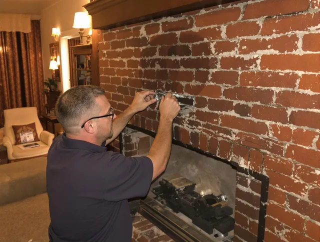 San Jacinto Chimney Sweep expert fixing a fireplace in San Jacinto, CA
